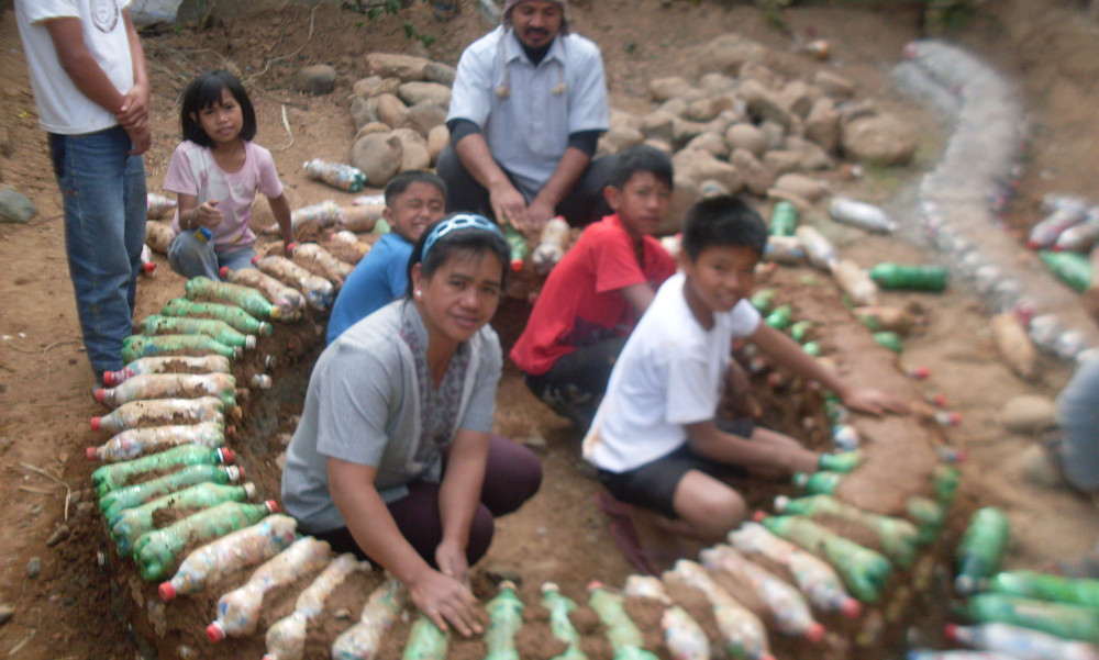 circular earth and ecobrick bench